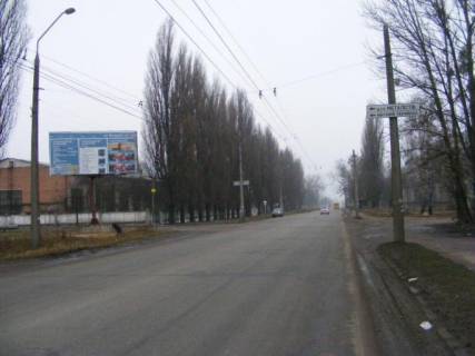 Білборд, Бігборд (Борд)  B у Житомирі, 3х6  вул.Параджанова, 62-Металістів, в центр (ЖЗМК, тамож.термінал, до АЗС ОККО, АЗС КЛО, мет.база АВ Метал Груп) Фото 1