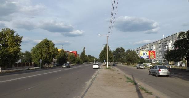 Білборд, Бігборд (Борд)  A у Коростишові, 3х6  вул. Київська, 109, навпроти Фуршету, Комфі, універмаг, напр. ринку, автовокзалу Фото 1