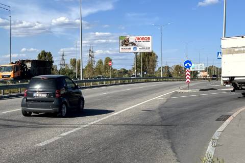 Білборд, Бігборд (Борд)  A у Києві, 6х3  вул. Богатирська, 80м за шляхопроводом (розподілювач в напрямку виїзда з м.Київ)- Б Фото 1