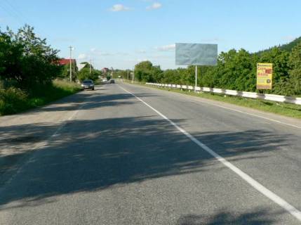 Білборд, Бігборд (Борд)  A у Яремче, 3x6  Траса Н-09 Мукачево-Львів, виїзд з міста в сторону Івано-Фр, біля кам`яного знаку Яремче,  напрямок руху на Івано-Франківськ Фото 1