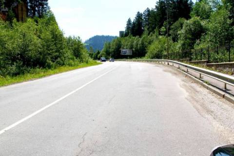 Билборд A в Яремче, 3x6  Траса Н-09 Мукачево-Львів, виїзд з міста в сторону Буковеля, санаторій "Яремче", голелі Велланд, Фортуна, Панська хата, напрямок руху на Буковель фото 1