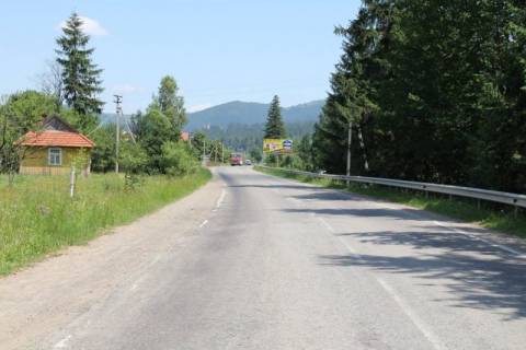 Билборд A в Микуличине, 3x6  Траса Н-09 Мукачево-Львів, колиба Гостинна Хата, 200 м перед газовою заправкою Калан, 500 м перед АЗС УкрНафта, напрямок руху на Івано-Франківськ фото 1