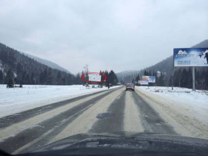 Билборд A в Татарове, 3x6  Траса Н-09 Мукачево-Львів, в`їзд в село зі сторони Буковеля, напрямок руху на Івано-Франківськ (меморіал) одразу після мосту фото 1