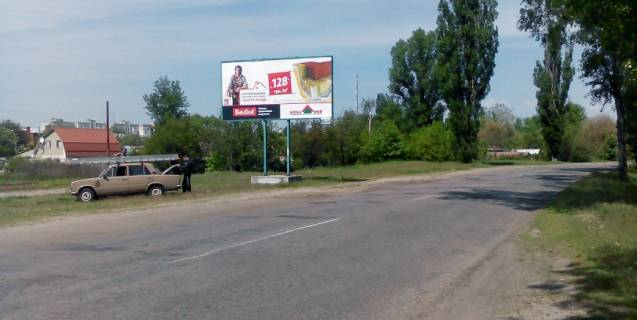 Билборд B в Кременчуге, 3х6  набережная л. Днепрова, д. № 19 (Крюков), со стороны Днепропетровска (Раковка) - Крюковский мост фото 1