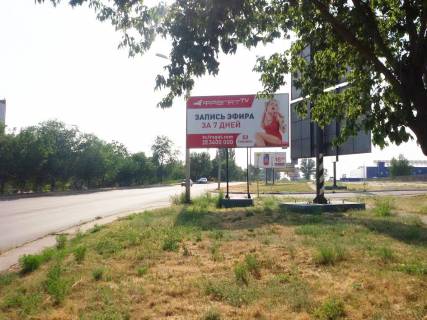 Білборд, Бігборд (Борд)  A у Кривому Розі вул. Бикова, 31, заїзд до стоянки ТЦ "Метро". Напрямок руху до ТЦ Епіицентру, ТЦ Метро, АЗС Сентоза и РЛС. Напрямок руху транспорту від об’їздної до пл. Поля Фото 1