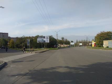 Білборд, Бігборд (Борд)  B у Кривому Розі вул. П.Глазового, 22, напрямок руху до вул. В.Великого, Микрорайон Вечірній, АТБ, РК Святошин. Великий спальний район. Фото 1