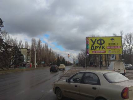 Білборд, Бігборд (Борд)  A у Кривому Розі перехрестя вул. Віталія Матусевіча та вул. Костенко, напрямок руху до вул. Олександра Васякіна  Фото 1
