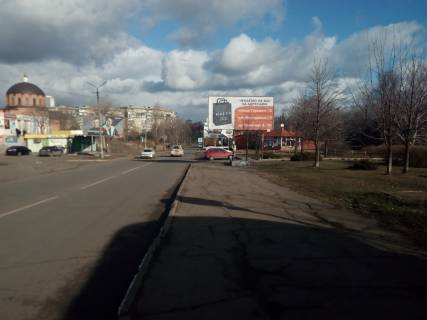 Білборд, Бігборд (Борд)  A у Кривому Розі мкр-н. Сонячний,30а, ст.ШТ "Жовтнева", напрямок руху від мкр-ну Сонячного до мкр-н Горняцкий Фото 1