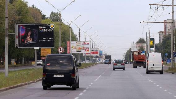 Білборд, Бігборд (Борд)  A у Львові, Щит 3x6  Наукова вул., 3а (ТЦ Панська гора, АЗС «ОККО», розідлова смуга) Фото 1