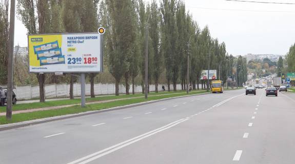 Білборд, Бігборд (Борд)  B у Рівному, Щит 3x6  Шухевича вул, 2, в центр Фото 1