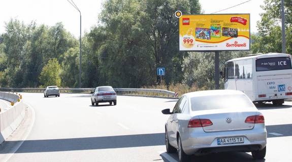 Білборд, Бігборд (Борд)  A у Києві, Щит 3x6  Дніпровське шосе, в напрямку до Обухова, за КПП, за пішохідним мостом (справа) Фото 1