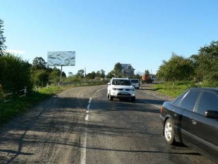 Білборд, Бігборд (Борд)  B у Делятині, 3x6  Траса Н-09 Мукачево-Львів, с.Делятин, 11 км. до Яремче, виїзд в сторону Івано-Франківська, напрямок руху на Івано-Франківськ Фото 1