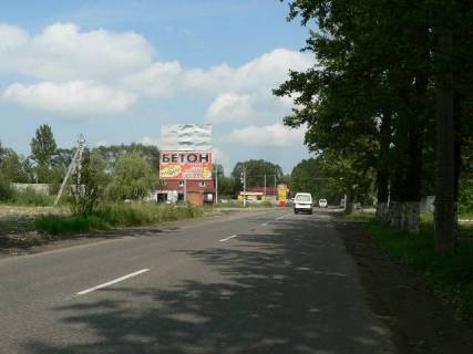 Билборд B в Надворной, 3x6  Траса Н-09 Мукачево-Львів, вул.Січинського, шиномонтаж, Лісбуд, будевільний серепмаркет, напрямок руху на Івано-Франківськ фото 1
