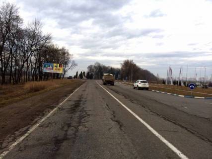 Билборд  в Богородчанах Траса Н-09 Мукачево-Львів, смт.Богородчани виїзд з смт. в сторону Івано-Франківська, супермаркет Світ Богородчан, після АЗС WOG, напрямок руху на Івано-Франківськ фото 1
