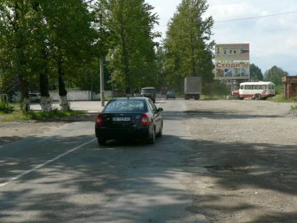 Билборд A в Надворной, 3x6  Траса Н-09 Мукачево-Львів, вул.Січинського, шиномонтаж, Лісбуд, будевільний серепмаркет, напрямок руху на Яремче, Буковель фото 1