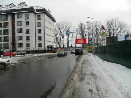 Билборд A в Петропавловской Борщаговке, Board 3x6м  вул. Ярослава Мудрого та вул. Мальовнича, клумба на перехр.., поруч  "Meest ПОШТА", "Фора", Кавярня "Гіркий" фото 1