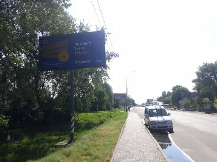 Билборд B в Софиевской Борщаговке, Board 3x6м  вул. Білогородська/ вул. Оборони, світлофор, напроти ЖК "Петровський квартал", поруч "Православна церква", "Фора", Ресторан "Прянощі", 50м. до Магазин-ресторан-готель «Лесик»,  в напрямку м. Вишневого, м. Києва фото 1