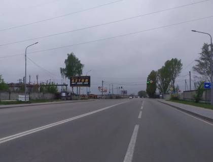 Білборд, Бігборд (Борд)  B у Святопетрівському, Board 3x6м  вул. Київська/вул. Індустріальна, світлофор, перехрестя, зупинка "Асфальтний завод", "Car service", Ресторан "Дальній кордон" Фото 1