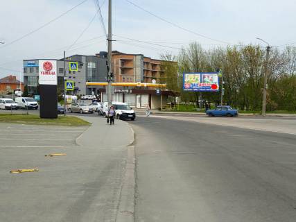 Білборд, Бігборд (Борд)  A у Хмельницькому, 3x6  Львівське шосе (коло, салон HONDA, азс УкрНафта) Фото 1