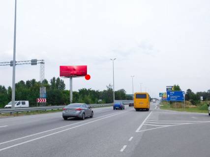 Мегаборд B у Київських трасах, 12x4  Виїзд з Києва, в сторону Житомира, біля повороту на Мілу, до котедж.городку Міла Петрушки Фото 1