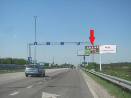 Білборд, Бігборд (Борд)  A у Київських трасах, 6x3  Житомирське шосе , в напрямку з м. Київ, за с.Міла, перед заправкою UPG, (заміський комплекс "Бабушкин Сад"),7км+600м, лівий Фото 1