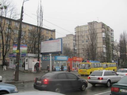 Білборд, Бігборд (Борд)  B у Києві, 5.7x2.8  Юрі Гната вул., 9 (ТЦ "Квадрат", ТЦ "Дитяча Країна", кінотеатр "Лейпциг", Сільпо, Велика кишеня, Ельдорадо), в напрямку просп. Л. Курбаса Фото 1