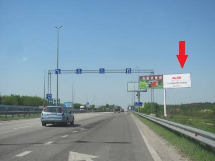 Білборд, Бігборд (Борд)  A у Київських трасах, 6x3  Житомирське шосе , в напрямку з м. Київ, за с.Міла, перед заправкою UPG, (заміський комплекс "Бабушкин Сад"),7км+600м, правий Фото 1