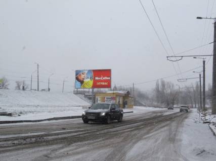 Билборд B в Кропивницкий (Кировоград), 6x3  Вокзальна вул. (Жовтневої революції вул.) (Магазин побутової хімії "Чистюля", перукарня "Смарагд"), в напрямку прос. Правди фото 1
