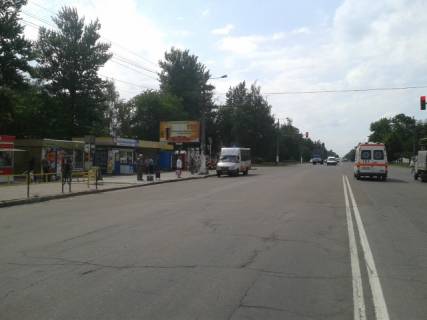 Билборд B в Житомире, 6x3  Миру просп., 37 (Мікрорайон ДОС, АТБ, аптека "Первоцвіт-Фарм", ПРОДМАРКЕТ "Проспект", ОщадБанк), в напрямку з центра міста фото 1