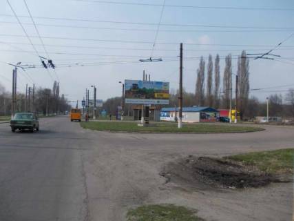 Білборд, Бігборд (Борд)  A у Сумах, 6x3  Харківська вул.,(пост ДАІ,шиномонтаж), в'їзд до міста Фото 1