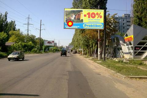 Білборд, Бігборд (Борд)  A у Миколаєві Космонавтів, 98 - ринок Буд-матеріалів Г-подібний щит над дорогою.., стА Фото 1