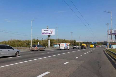 Билборд B в Васильевке, 5x12  Шухевича Романа просп. (Генерала Ватутіна просп.), : парк Дружби народів; Московський міст (в напр. Троєщини) фото 1