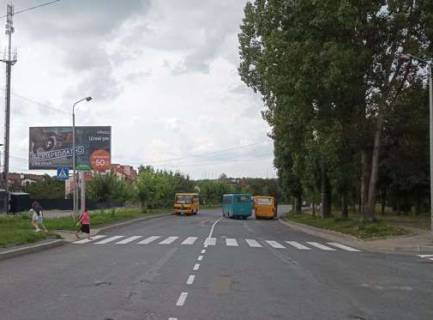 Білборд, Бігборд (Борд)  B у Рівному, 3x6  Коновальця Євгена вул. - Мельника Андрія вул. Фото 1