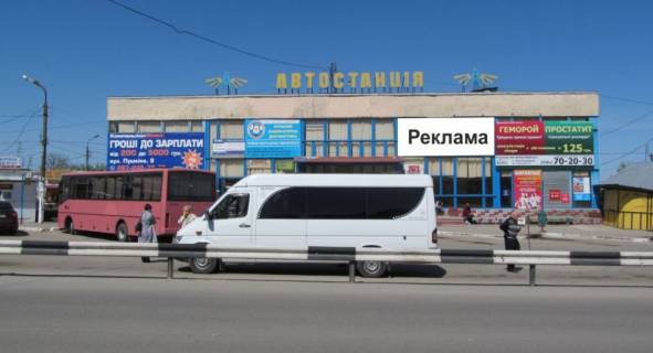 Білборд, Бігборд (Борд)  A у Волочиськ, 2,40х5,95  ВУЛ. Незалежності, 30 Фото 1
