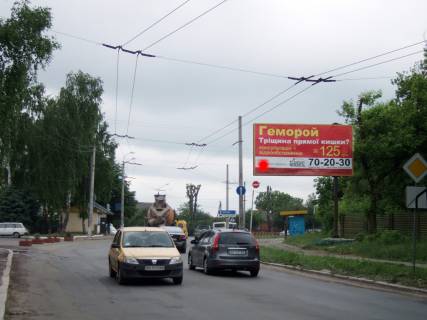 Билборд A в Хмельницком, 3*6  Львівське шосе, зупинка "Ринок", неподалік: Хмельницька "Толкучка" > 30 ринків, ломбарди, магазини, АЗС (в центр) фото 1