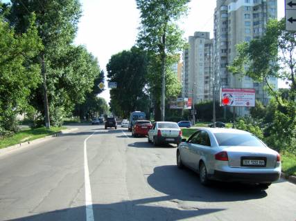 Білборд, Бігборд (Борд)  A у Хмельницькому, 3*6  перехрестя Старокостянтинівське шосе - вул.Прибузька, (шиномонтаж). неподалік: автостоянка, шиномонтаж, АЗК, супермаркет "Вопак", непродовольчий ринок (в центр) Фото 1