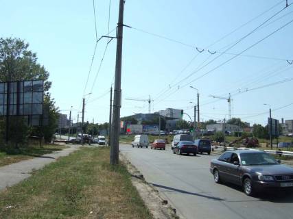 Билборд A в Хмельницком, 3*6  перехрестя вул.П.Мирного - вул.Озерна. неподалік: автосалон "АІС", склади будматеріалів (в центр) [ліве вухо] фото 1