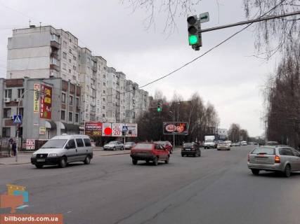 Білборд, Бігборд (Борд)  B у Хмельницькому, 3*6  вул.Прибузька, 6 (міст на "ЕпіцентрК"). неподалік: "Епіцентр", супермаркет "Таврія В", "Сільпо", ТРЦ "Оазис", центральний ринок, елітна забудова "Набережний квартал" (центр) [ліве вухо] Фото 1