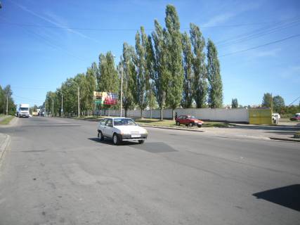 Білборд, Бігборд (Борд)  A у Рівному, 6х3м  м. Рівне, вул. Шухевича, навпроти будинку №2 Фото 1