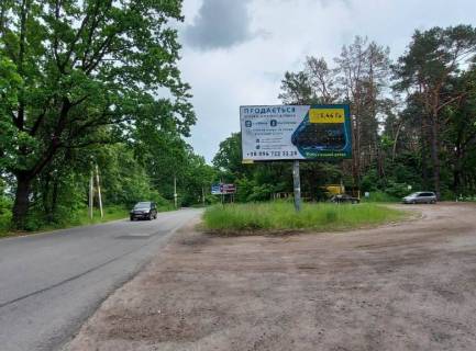 Білборд, Бігборд (Борд)  A у Українці, 6х3  м. Українка, вул. Київська, км 2+950 право, поворот на с. Плюти, автобусна зупинка, перед котеджним містечком "ПЛЮТОВО" Фото 1