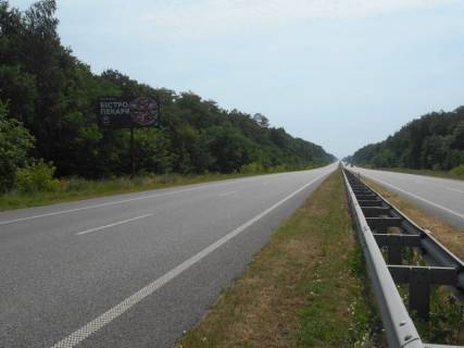 Билборд B в Березане, 6х3  м. Березань, харківська траса, траса М-03 "Київ-Харків", км 77+410 ліво, КПП ДАІ Березань фото 1