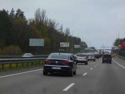 Билборд B в Капітанівке, 6х3  с. Капітанівка, траса М-06 "Київ-Чоп" (Житомир), км 23+300 ліво, за поворотом на базу "Снайпер" фото 1