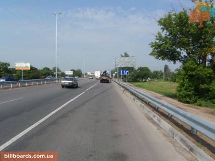 Білборд, Бігборд (Борд)  A у Міла, 6х3  траса М-06 "Київ-Чоп" (Житомир), км 26+160 право, магазин "Фора", ресторан "Козачок" Фото 1