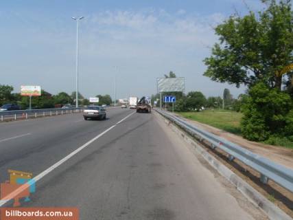 Білборд, Бігборд (Борд)  A у Міла, 6х3  траса М-06 "Київ-Чоп" (Житомир), км 26+160 право, магазин "Фора", ресторан "Козачок" схема