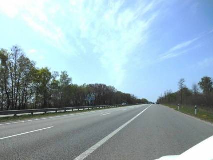 Билборд B в Київських трасах, 6х3  Траса М-06 "Київ-Чоп" (Житомир), км 42+350 ліво, за 1км до повороту на Мотижин, за 1км до повороту на котеджне містечко "Німецька слобода" фото 1