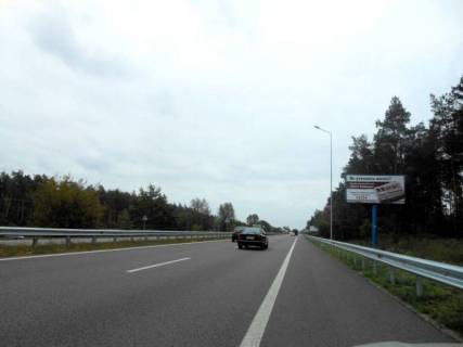 Білборд, Бігборд (Борд)  A у с. Нові Безрадичі, 6х3  Новообухівська траса, км 35 + 120 право, перед з / д станція, навпроти кіт. містечко "Грін Вуд", за поворотом на с. Нові Безрадичі Фото 1