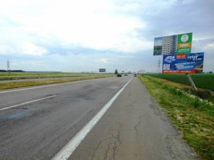 Билборд A в Бровары, 6х3  Траса М-01 "Київ-Чернігів-Нові Яриловичі", км 24+100 право, об'їзд м. Бровари, через 800м після перетину вул. Переяславський Шлях та вул. Лагунової, ресторану "Петрівський Бровар" та АЗС ОККО, за 1.5км до повороту на трасу Р-03 (Північно-Східний фото 1