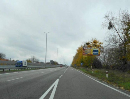 Билборд A в Мрії, 6х3  с. Мрія, траса М-06 "Київ-Чоп" (Житомир), км 28+850 право, через 50м після автобусної зупинки, через 150м після поворту на вул. Мрія, за 850м до АЗС Motto фото 1
