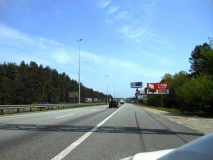 Білборд, Бігборд (Борд)  A у Стоянці с. Стоянка, траса М-06 Київ-Чоп (Житомир), км 22 + 575 ліво, 375м до АЗС GLUSCO, 700м до АЗС КЛО, перед розв'язки на Ірпінь, Білогородку Фото 1