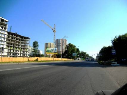 Билборд B в Бровары, 6х3   м. Бровари, вул. Київська, 261, через 40м після автобусної зупинки та магазину "Varus", через 40м після заїзду на ринок, через 170м після повороту на вул. Василя Симоненка та вул. Короленка, за 70м до повороту до магазину "АТБ", за 145м до АЗС фото 1